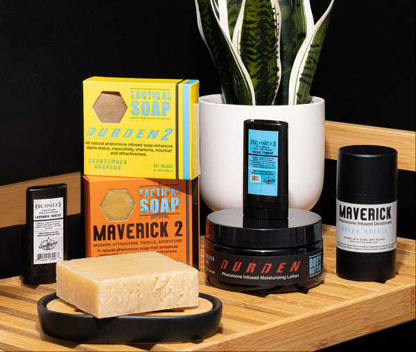 Collection of Tactical Soap soaps and grooming products on a wooden surface with a black background